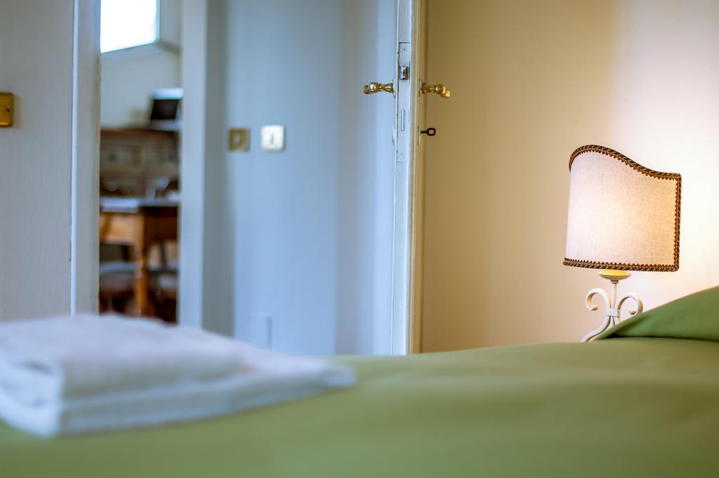 Attico Sopr'Arno Apartment Флоренция Стая снимка
